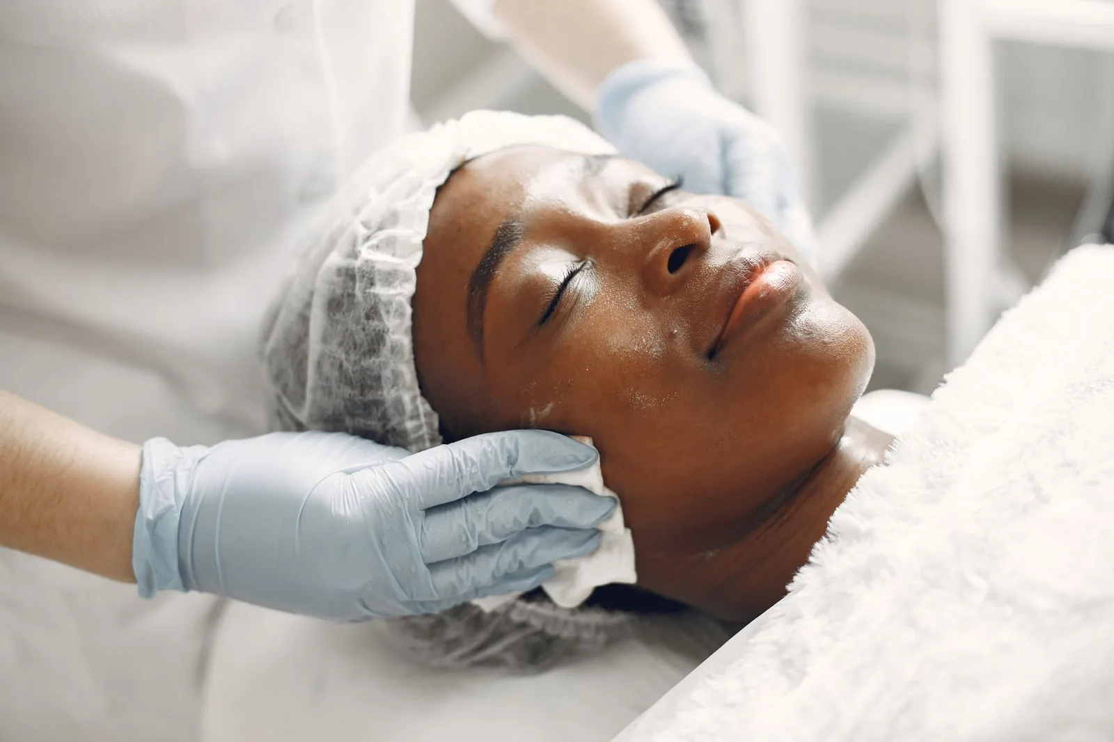 Client relaxing during a custom facial
